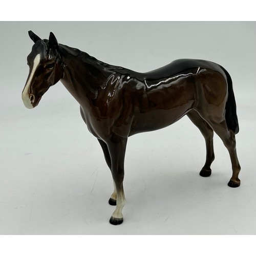 435 - Four Beswick Horses to include 2 x Bays with white blaze front socks 28cm & 20cm, Palomino with whit... 