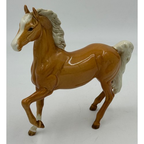 435 - Four Beswick Horses to include 2 x Bays with white blaze front socks 28cm & 20cm, Palomino with whit... 