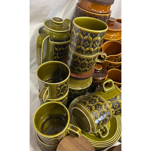 437 - A large quantity of Hornsea Pottery 'Heirloom' on orange and green pattern to include coffee pot, cu... 