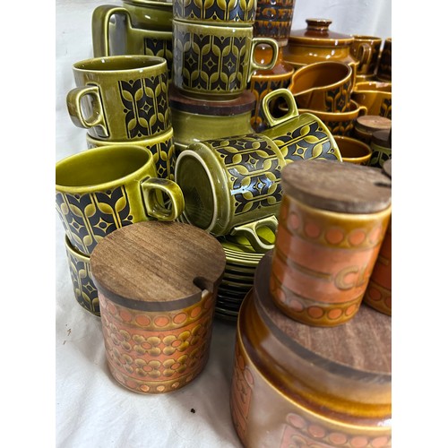 437 - A large quantity of Hornsea Pottery 'Heirloom' on orange and green pattern to include coffee pot, cu... 