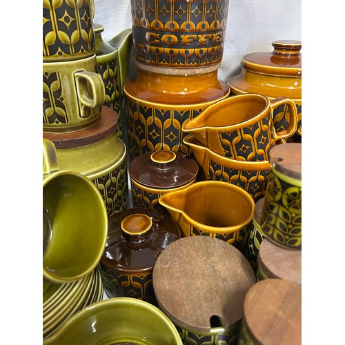 437 - A large quantity of Hornsea Pottery 'Heirloom' on orange and green pattern to include coffee pot, cu... 