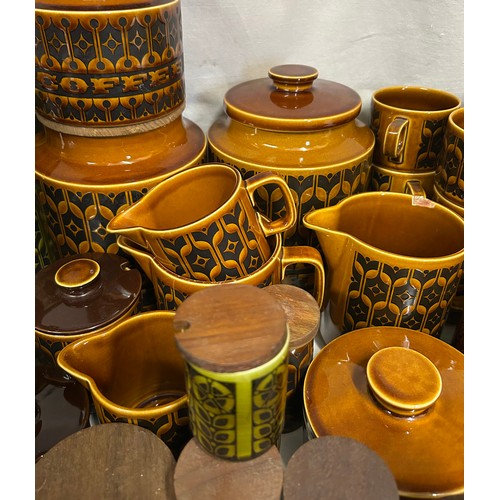 437 - A large quantity of Hornsea Pottery 'Heirloom' on orange and green pattern to include coffee pot, cu... 