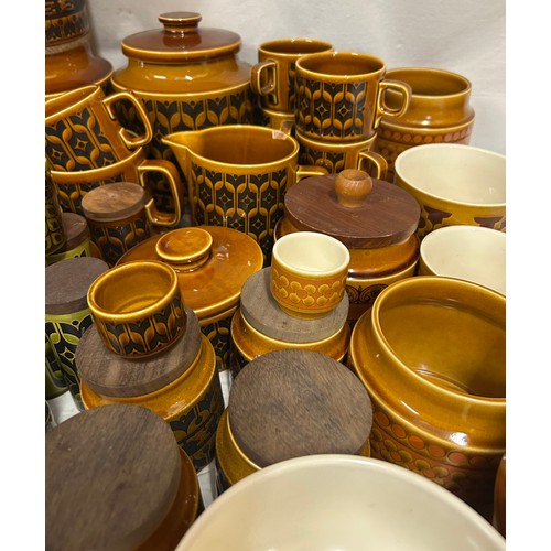 437 - A large quantity of Hornsea Pottery 'Heirloom' on orange and green pattern to include coffee pot, cu... 