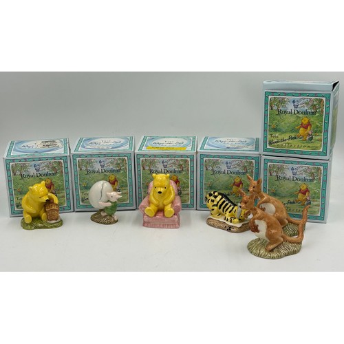 438 - A collection of 14 Royal Doulton Winnie the Pooh figurines to include Eeyore loses a Tail WP15 limit... 