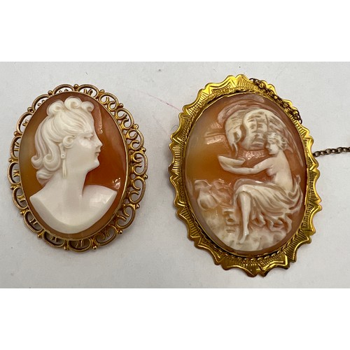 613 - Two carved shell cameo brooches set in 9 carat yellow gold, one with safety chain. Total weight 16.9... 