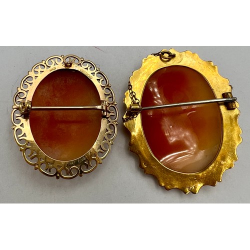 613 - Two carved shell cameo brooches set in 9 carat yellow gold, one with safety chain. Total weight 16.9... 