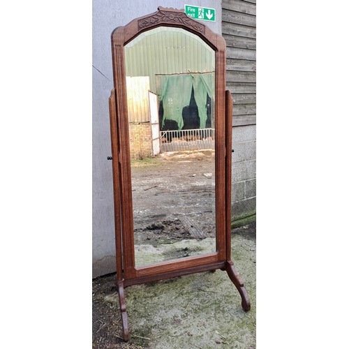 43 - An early 20thC oak cheval mirror. 190cm h x 80cm w x 53cm d.