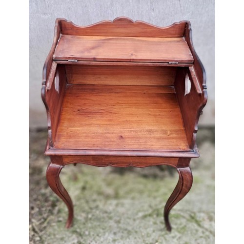 45 - A 19thC cabinet with folding top shelf on cabriole legs with heart shaped cutouts to either side. 73... 