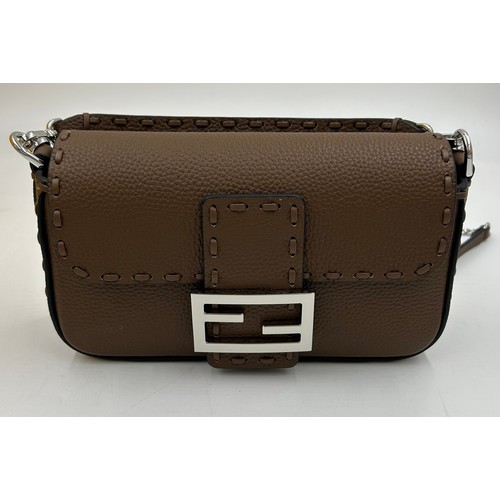 878 - A genuine Fendi Baguette mini leather bag comes with dust bag and box.