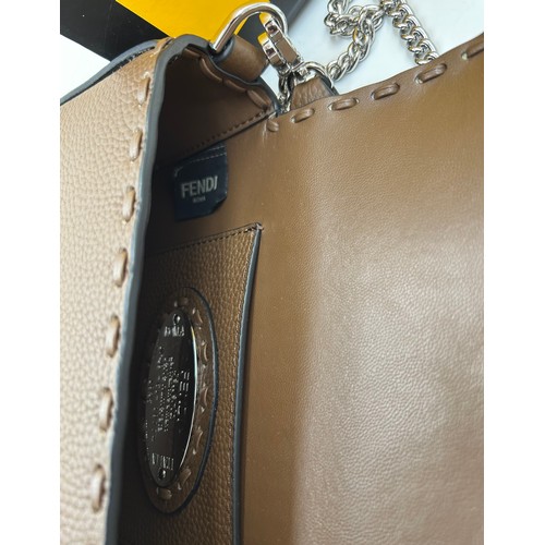 878 - A genuine Fendi Baguette mini leather bag comes with dust bag and box.