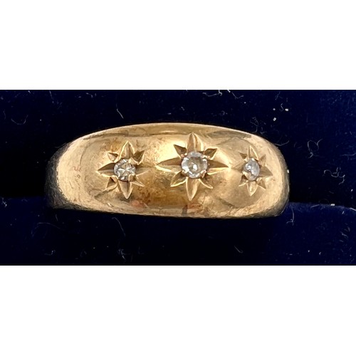 626 - A nine carat gold ring set with three clear stones. Size Q. Weight 2.2gm.