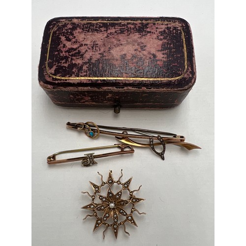 628 - Three 9 carat gold bar brooches and an unmarked yellow metal and seed pearl bar brooch in fitted cas... 