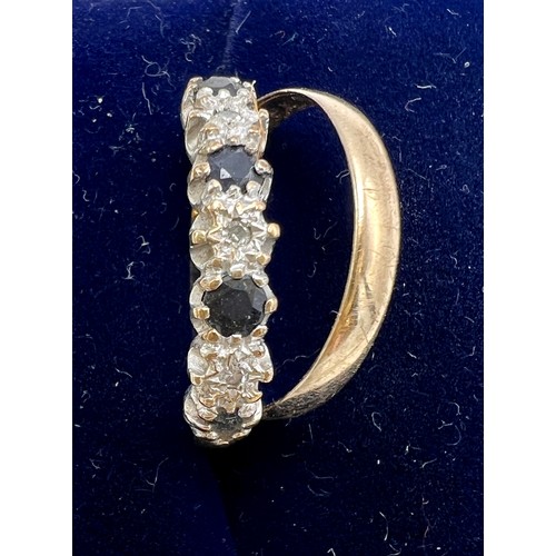 630 - Two 9 carat gold rings, one set with sapphires and diamonds, size L, the other a wedding band, size ... 