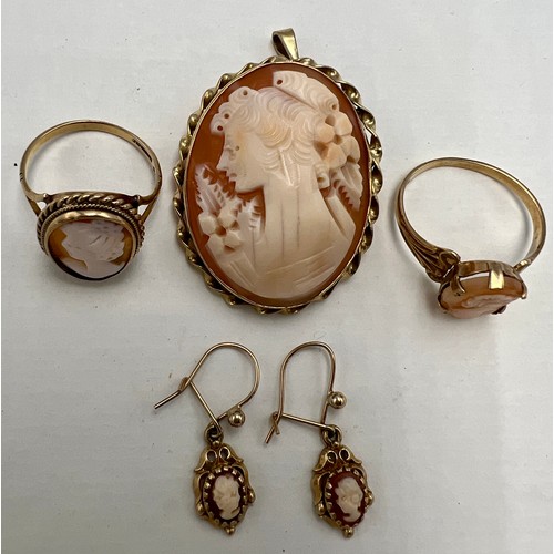 634 - A shell cameo brooch with 9 carat gold surround, two 9 carat gold cameo rings and a pair of earrings... 