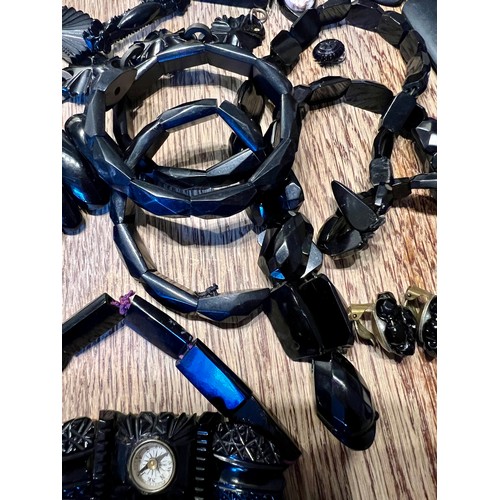 638 - A quantity of mainly 19thC Whitby jet jewellery to include earrings, snake necklaces, buckle,  compa... 