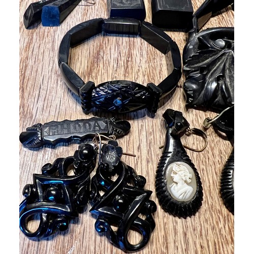 638 - A quantity of mainly 19thC Whitby jet jewellery to include earrings, snake necklaces, buckle,  compa... 