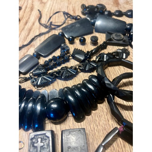 638 - A quantity of mainly 19thC Whitby jet jewellery to include earrings, snake necklaces, buckle,  compa... 