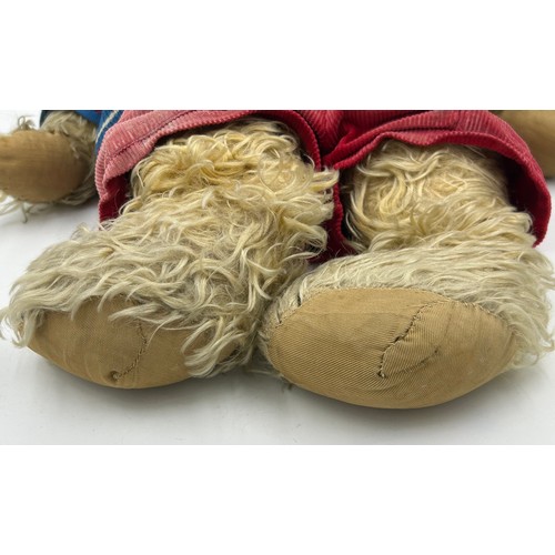 1128 - Vintage straw filled teddy bear measuring approx 66cm.