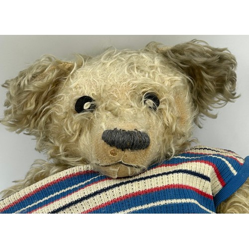 1128 - Vintage straw filled teddy bear measuring approx 66cm.