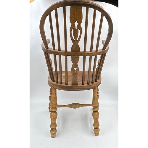 52 - A 20thC child's Windsor chair. 7cm h.