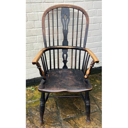 53 - A Windsor chair. 103cm h x 49cm w. Ht to seat 30cm.