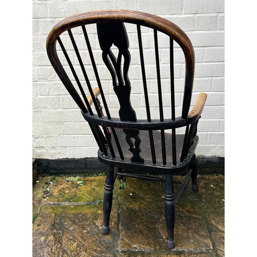 53 - A Windsor chair. 103cm h x 49cm w. Ht to seat 30cm.