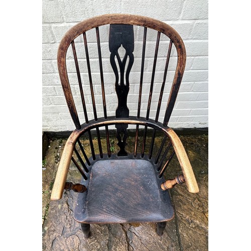 53 - A Windsor chair. 103cm h x 49cm w. Ht to seat 30cm.