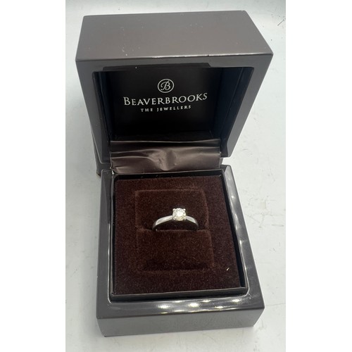 642 - A solitaire diamond ring set in platinum. Size I. Weight 3.7gm.