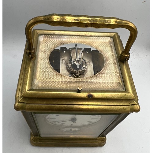 995 - A grand sonnerie carriage clock with gorge case, repeat and alarm, striking on two gongs. The back p... 