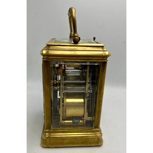 995 - A grand sonnerie carriage clock with gorge case, repeat and alarm, striking on two gongs. The back p... 