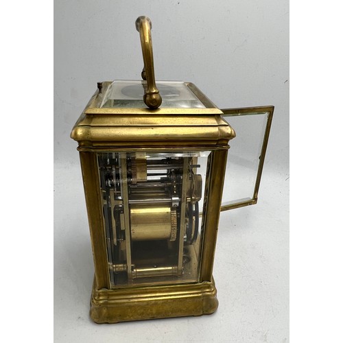 995 - A grand sonnerie carriage clock with gorge case, repeat and alarm, striking on two gongs. The back p... 