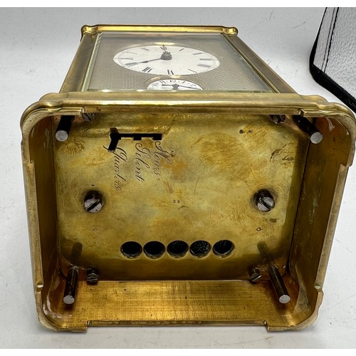 995 - A grand sonnerie carriage clock with gorge case, repeat and alarm, striking on two gongs. The back p... 