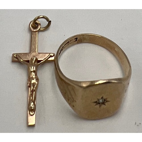 648 - A 9 carat gold diamond set signet ring, size P together with a 9 carat gold crucifix. Total weight 5... 