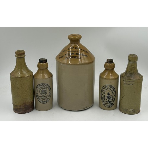 1238 - A collection of stoneware comprising a J.W. Turner, Driffield half gallon flagon, 2 x Victorian port... 