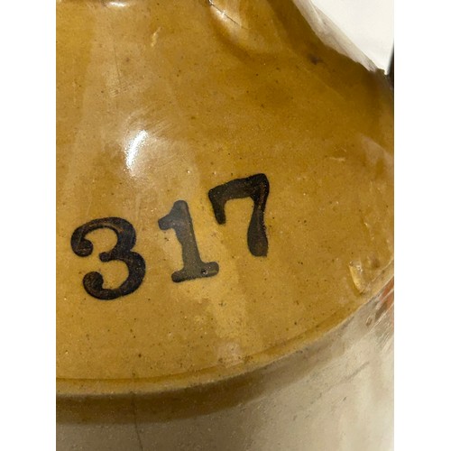 1238 - A collection of stoneware comprising a J.W. Turner, Driffield half gallon flagon, 2 x Victorian port... 