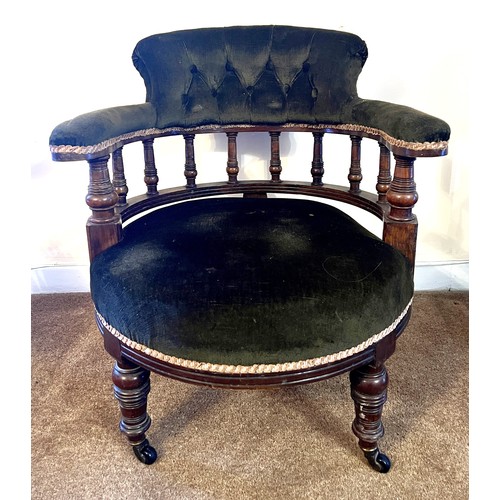 56 - A 19thC mahogany nursing chair on castors with button back upholstery. Height to back 72cm. 64cm w, ... 