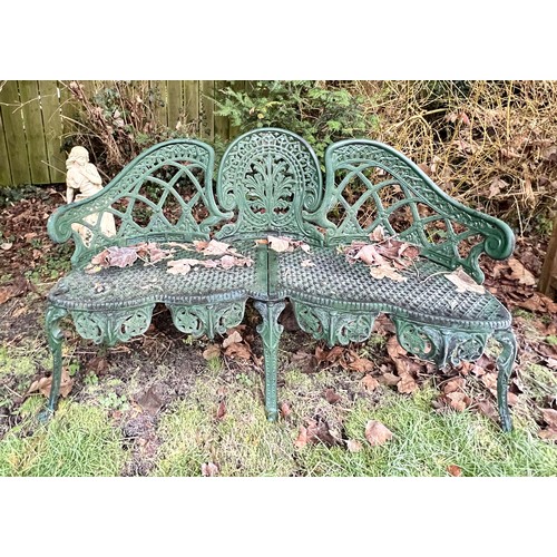 13 - A decorative green metal garden seat. 130 w x 76cm h.