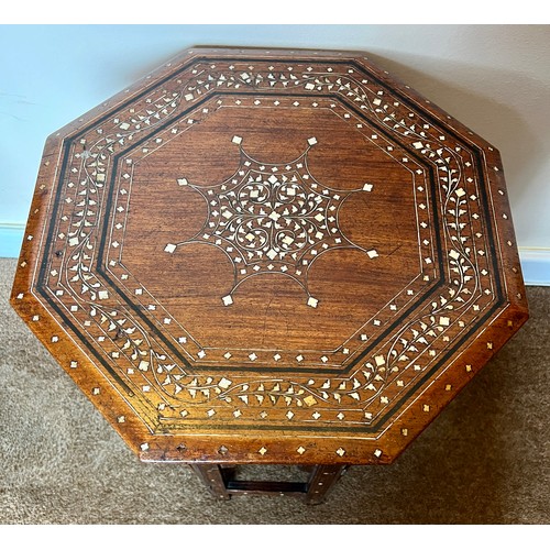 61 - An Anglo Indian Hoshiarpur octagonal table with ebony and bone inlay. 47 h  x 46 x 46cm.