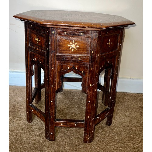 61 - An Anglo Indian Hoshiarpur octagonal table with ebony and bone inlay. 47 h  x 46 x 46cm.