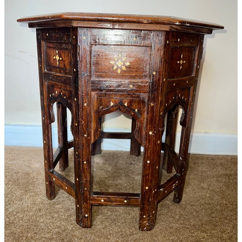 61 - An Anglo Indian Hoshiarpur octagonal table with ebony and bone inlay. 47 h  x 46 x 46cm.