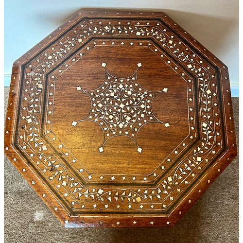 61 - An Anglo Indian Hoshiarpur octagonal table with ebony and bone inlay. 47 h  x 46 x 46cm.