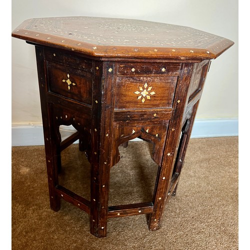 61 - An Anglo Indian Hoshiarpur octagonal table with ebony and bone inlay. 47 h  x 46 x 46cm.