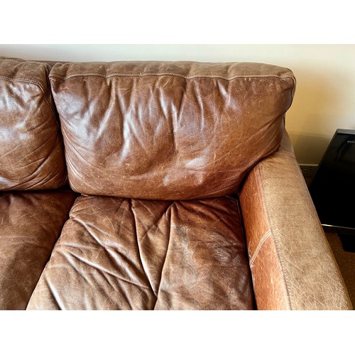 68 - A brown leather 2 seater sofa. 162 w x 100 d x 88cm h.