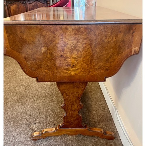 77 - A burr walnut sofa table with 2 drawers to front and lift up leaves to each side. 73 h x 96 w x 58cm... 