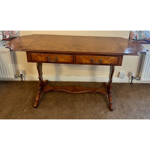 77 - A burr walnut sofa table with 2 drawers to front and lift up leaves to each side. 73 h x 96 w x 58cm... 