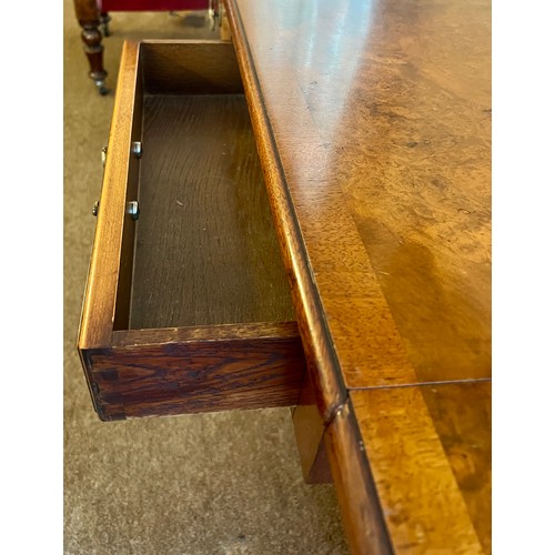 77 - A burr walnut sofa table with 2 drawers to front and lift up leaves to each side. 73 h x 96 w x 58cm... 