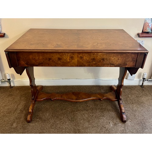 77 - A burr walnut sofa table with 2 drawers to front and lift up leaves to each side. 73 h x 96 w x 58cm... 