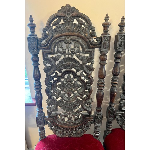 85 - A set of four 19thC high back carved Jacobean revival chairs. 125cm h to back.