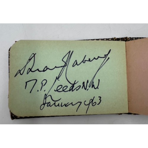 929 - Leeds United interest. A small autograph book containing autographs relating to Leeds United in 1962... 