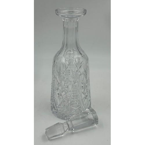 501 - A set of 6 Waterford Crystal ‘Clare’ wine glasses and a matching decanter, 34cm to top of stopper.